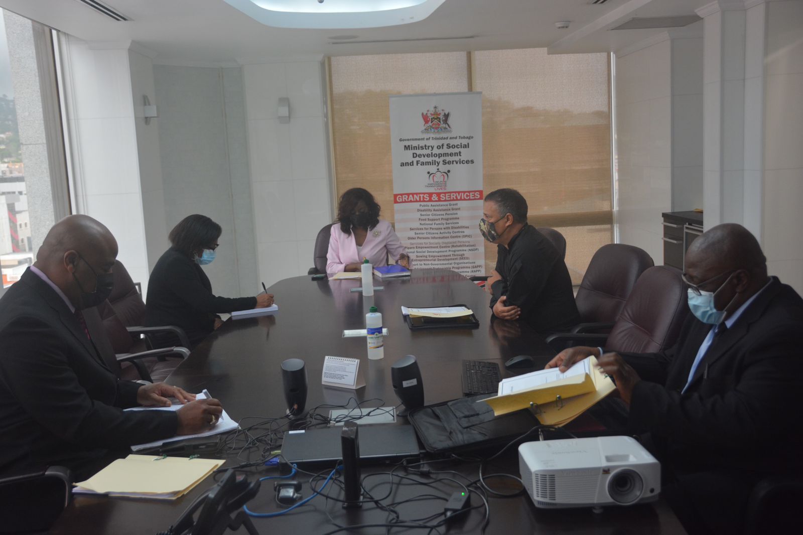 In Keen Discussion Senator The Hon Donna Cox, Minister of Social Development and Family Services meets with Commissioner of Police Gary Griffith and his team at the TTPS to discuss fraud.jpeg